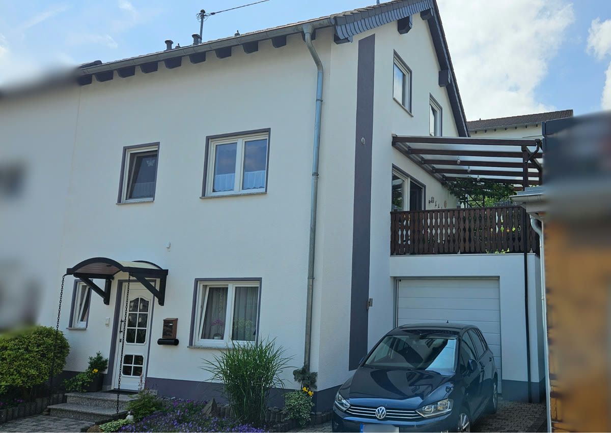 Doppelhaushälfte mit Garage und Garten in Neuwied-Feldkirchen, verkauft